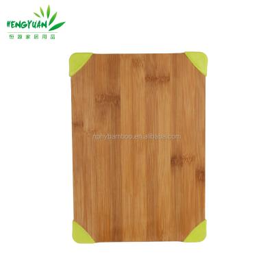 China Viable Non-Slip Green Silicone 4 Corner Bamboo Cutting Board for sale