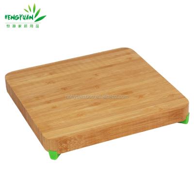 China Sustainable organic bamboo mini cutting board with rubber feet for sale