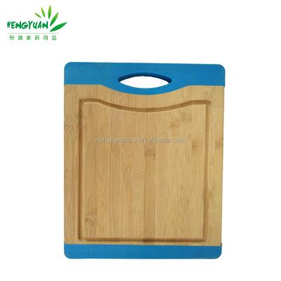 China Sustainable Cheap Bamboo Grooved Cutting Chopper With Silicone for sale