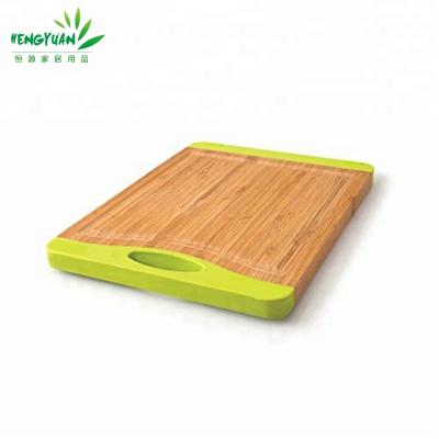 China Disposable Eco - Friendly Natural Bamboo Organic Cutting Board With Silicon for sale