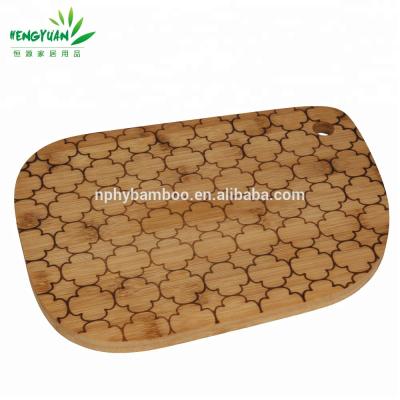 China Sustainable New Design Bamboo Fruit Shape Cutting Board With Hole for sale