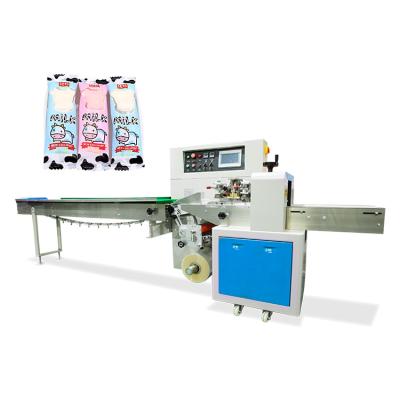 China Automatic Food Foshan Food Confectionery Packaging Machine Pillow Candy Packaging Machine for sale