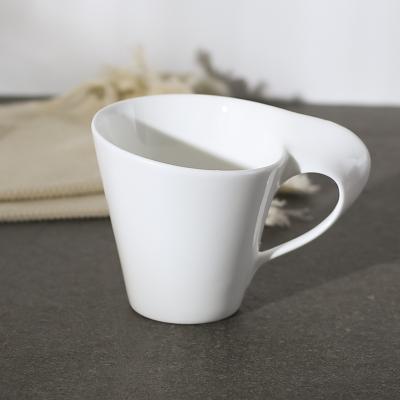 China Creative Viable Quality Fine Bone China Novelty Shape Bone China 8oz Ivory Fine Cup With Wavy Handle for sale