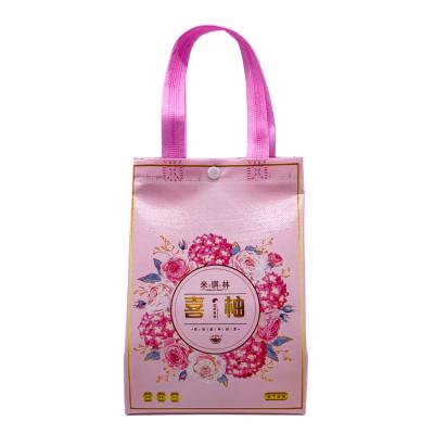 China Recyclable Factory Wholesale Reusable Eco Friendly Colorful Pink Handled Nonwoven Bags With Custom Printed Logo for sale