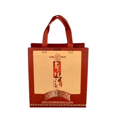 China Affordable Recyclable Fashionable Eco-Friendly Materials And Foldable Bottom 2&4 Wine Nonwoven Shopping Bag With Customize Logo for sale