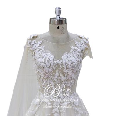 China newest anti-wrinkle hot sale design see though bodice princess wedding dress with nice 3D flowers lace up and removable cape on the shoulder for sale