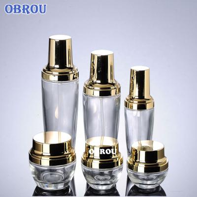 China Aseptic Luxury Glass Cosmetic Glass Jar Cream Bottle Spray Packaging Cosmetic Bottle With Pump And Cap for sale