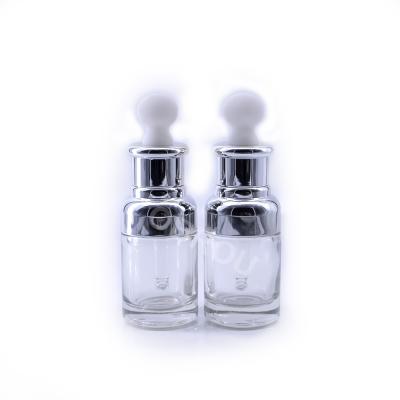 China High Quality Personal Care Perfume Oil Bottle 30ml 50ml Glass Cosmetic Perfume Bottle With Pipette And Silver Cap for sale