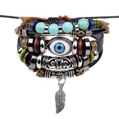 China FASHIONABLE Stone Feather Tibetan Multilayer Leather Bracelet Eye Fish Charm Beads Bracelets For Men Wrap Bracelet Bangle Punk Leather for sale