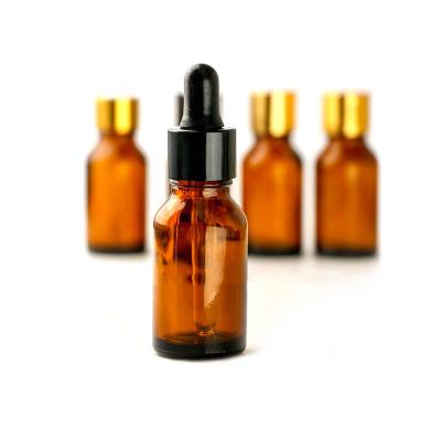 China Healthy Brown 15ml Essential Oil Bottle With Gold Screw Cap And Inner China Plug for sale