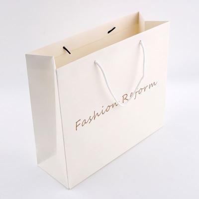 China Factory Custom Recyclable Yunqian Logo Print Wedding Rose Paper Bag Design Sample for sale