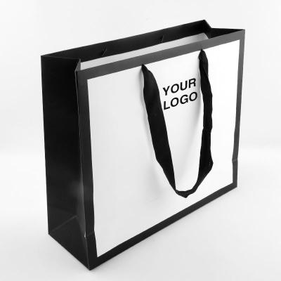 China Recyclable Custom Bag With Gold Foil Logo Rose Ribbon Handles Boutique Luxury Clothes Shopping Paper Bag for sale