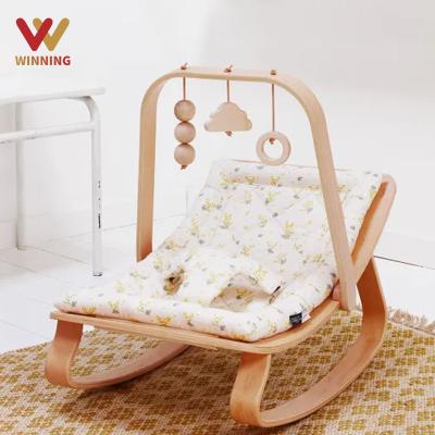 China Safety Comfortable Baby Chair New Childhood Rocking Chair Wooden Crib Bed Small for Baby Bouncer Balance Rocker Chair Baby Bouncer Bedroom Furniture for sale