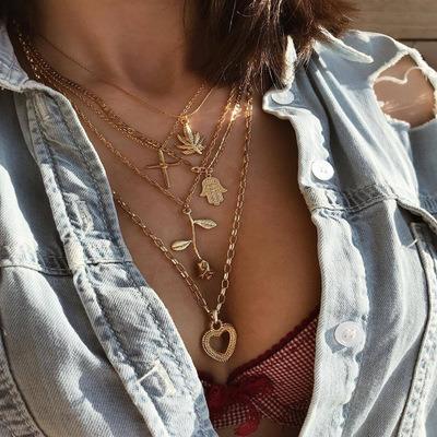 China Mixed Multilayer Gold Clavicle Design Necklace Women Heart Cross High Shiny Polished Chain Hand Rose Pendant Necklace Jewelry for sale