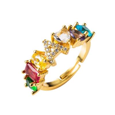 China Newest New Arrival Fashionable Luxury Women Finger Jewelry Colorful Zircon 26 Shaped Initial Letter Gold Alloy Rings For Women for sale