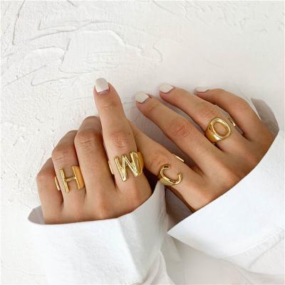 China 2020 New Fashionable European Shaped Wide Adjustable Finger Ring For Women Jewelry Initial Letter Metal 26 Design Statement Gold for sale