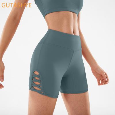 China Drop Shipping Breathable Yoga Pants Drop Waist Hip Pants Personality Strap High Compression Spandex Sports Shorts for sale