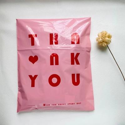 China Wholesale Strong Adhesive Thank You Poly Mailer Bag With Red Printing Biodegradable Pink Clothing Mailing Bags for sale