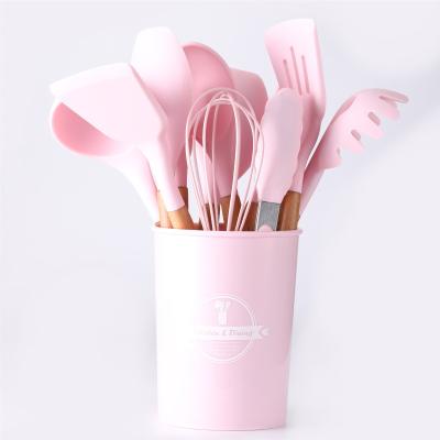 China Hot Selling Casual Women's Pink China Wood Handle 11PCS Silicone Kitchen Utensils for Baking for sale