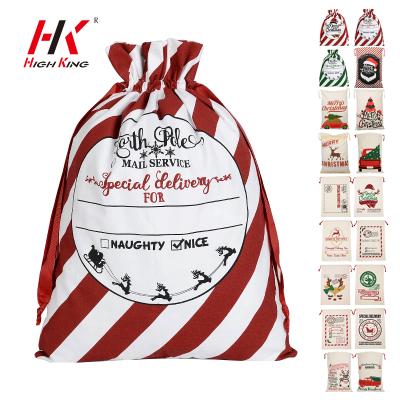 China High Small Claus Drawstring Sacks New Design Canvas Candy Plastic Santa Sack King In Stock Christmas Gift Bags for sale