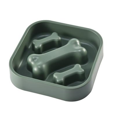 China Slow Sustainable Design Solid Plastic Dog Bone Driver Pet Bowl Pet Food Bowl Dog Health Feeding Slow Feeding Bowl for sale