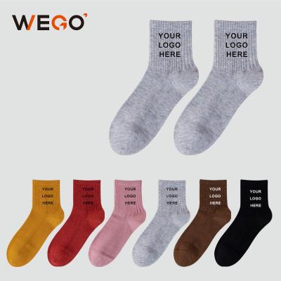 China Free Sample Logo Wholesale Custom Fashion Cotton New Sports Single Men's Breathable Women Color Socks Breathable Socks for sale