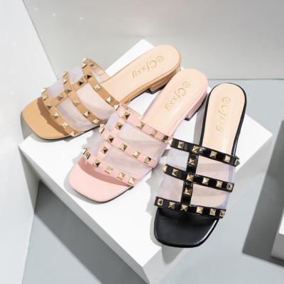 China New fashion trend riveted women's fashion flat shoes with voluminous heels slipper for sale