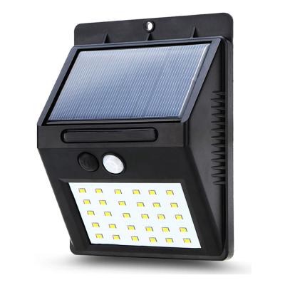 China Polycarbonate Security Outdoor PIR Motion Sensor 30 LED Solar Panel Wall Light For Garden for sale