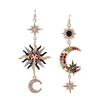 China Ethnic popular sun and moon are exaggerated irregular asymmetrical long earrings women's dangle earrings for sale