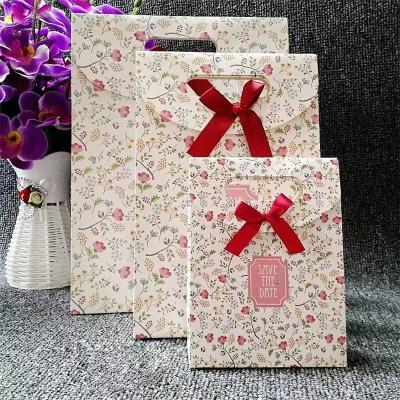 China Manufacturers recyclable custom printed small paper bag packaging and gift paper shopping bags. for sale