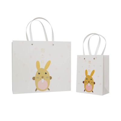 China Cute Packaging Fashionable Paper Bag Materials Gift Paper Bag Recycled Hard Paper Bag for sale