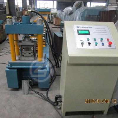 China Automatic Cut Hangzhou Zhongyuan Machinery Rolling Shutter Door Roll Forming Machine for sale