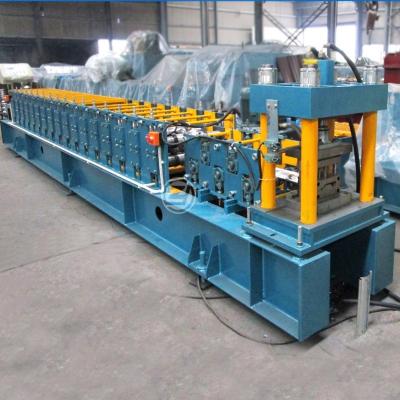 China Automatic Hydraulic Cutting Customized Galvanized Roof Cold Roll Forming Machine Shutter Door Roll Forming Machine for sale