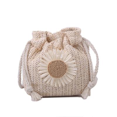 China Straw Knit Drawstring Pouch Mini cute simple portable drawstring ladies cross - body bags for women beach outdoor summer for sale