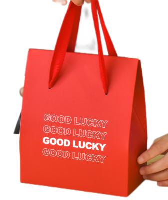 China Quality Customization Recyclable Guaranteed Unique Gift Printed Crosshair Paper Bag for sale