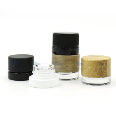 China Hot Sale 3.5g Eye Cream Cosmetic Round Cosmetic Container Clear Glass Jar With Bamboo Plastic Lid for sale