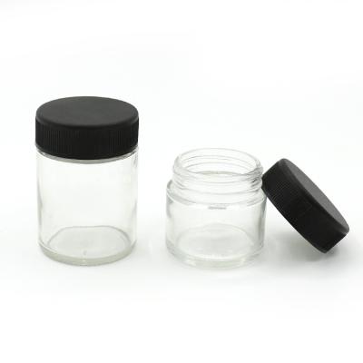 China Food 1 2 oz Empty Stash Wide Mouth Containers Round Child Resistant Glass Jars Black With Cap for sale