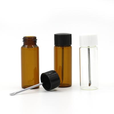 China Clear 15ML Cosmetic Wholesale CR Jar and Amber Tube Glass Bottle with Metal Spoon Snuff Bottles for sale