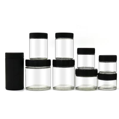 China Wholesale Cosmetic Clear Glass Jar 30ml 60ml 75ml 100ml Straight Side Glass Jar With Black Cover for sale