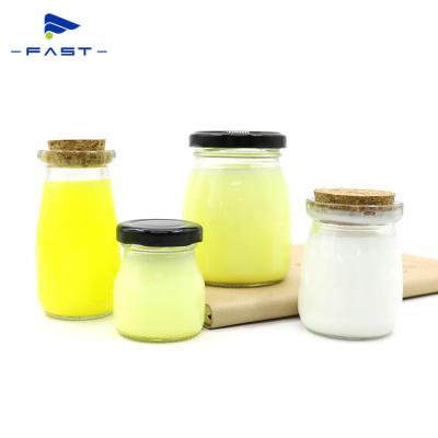 China Hot Selling Clear 50ml 100ml 200ml Food Container Yogurt Milk Storage Glass Pudding Jar With Metal Lids for sale