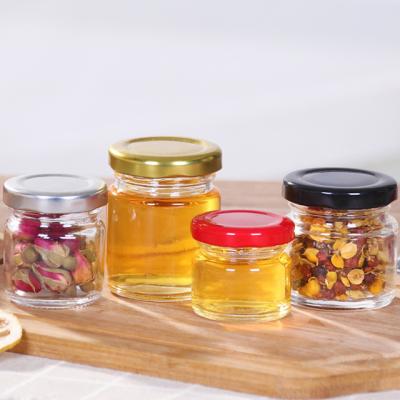 China Custom Logo Variety Size Transparent Round Food Jam Sauce Packaging Glass Honey Bottle And Jar With Twist-off Lid for sale