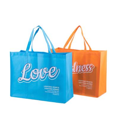 China Reusable Promotional Custom Fashion Metallic Laminated Nonwoven Shopping Bags for sale