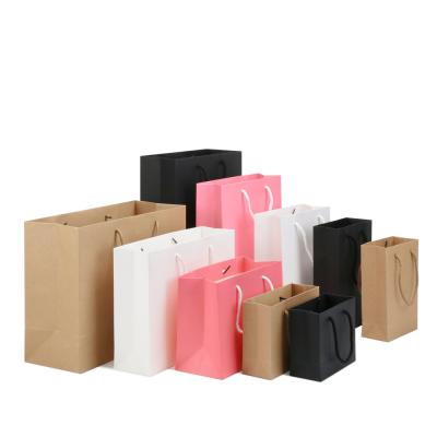 China Wholesale Fashion Reusable Personalized Custom Printed LOGO Luxury Gift Kraft Paper Shopping Bags for sale