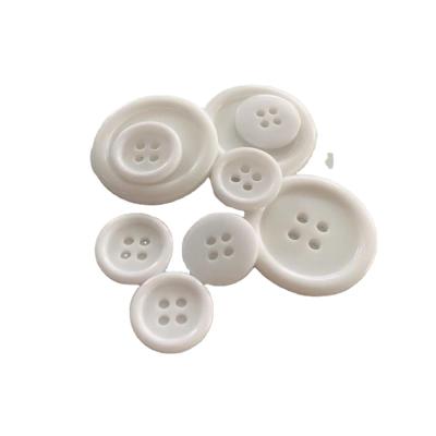 China Wholesale 14L-80L Viable Custom Solid Polyester Chalk White Button With Logo for sale