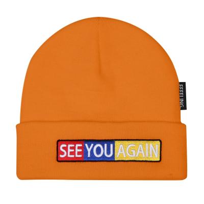 China Warm orange 100% acrylic beanie custom beanie embroidery unisex beanies for sale