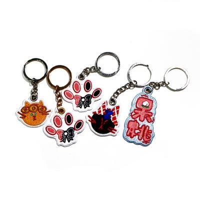 China Wholesale Cheap Price Custom Polyester Plain Embroidery Key Tags Custom Embroidered Keychain zu verkaufen