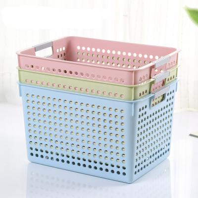 China The sustainable concise vegetable plastic storage basket with handle for bathroom homekitchen for sale