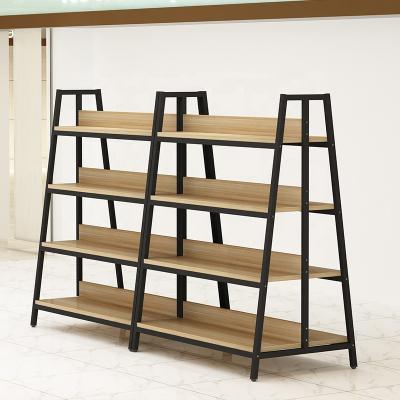 China miniso double sided wholesale wooden display rack retail store display shelving system for miniso store for sale