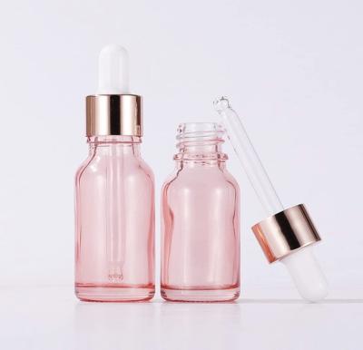 China Travel Vial Container 10ml Cosmetic Pink Glass Perfume Bottles Eco-friendly Recyclable Rose-Gold Caps For Essential Oils for sale