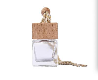 China Open Cover Wooden Clamp Car Air Freshener Empty Glass Bottle Hanging Oil Diffuser for sale